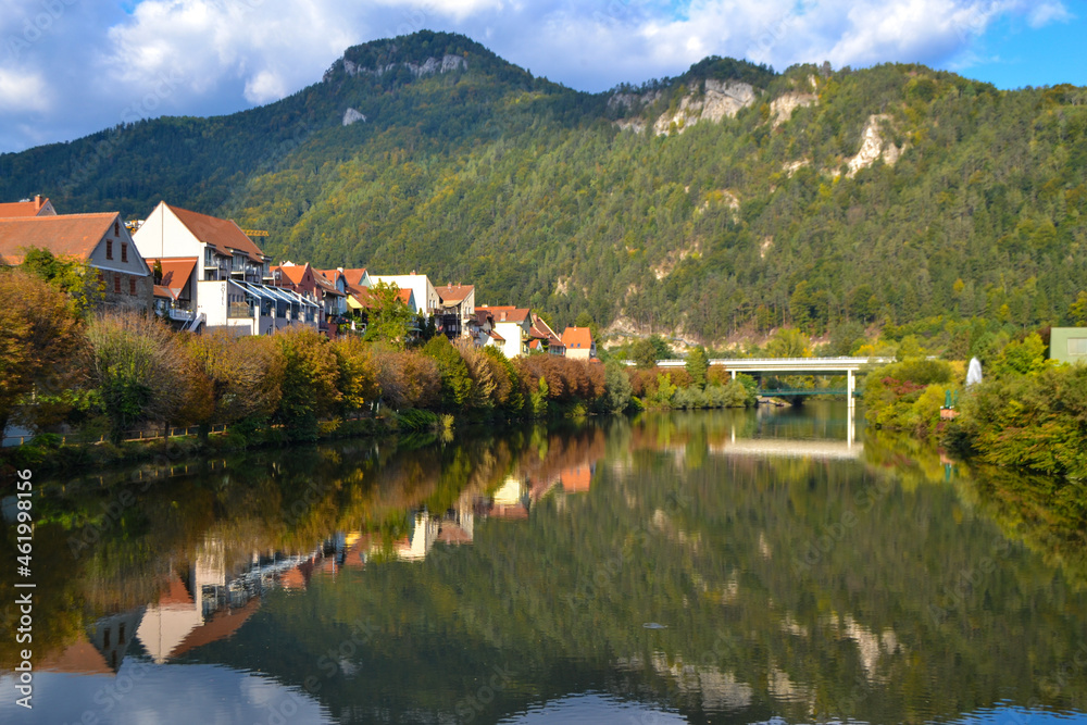 Fronleiten, a beautiful tourist town in Austria. Lake and mountains in the city in autumn.