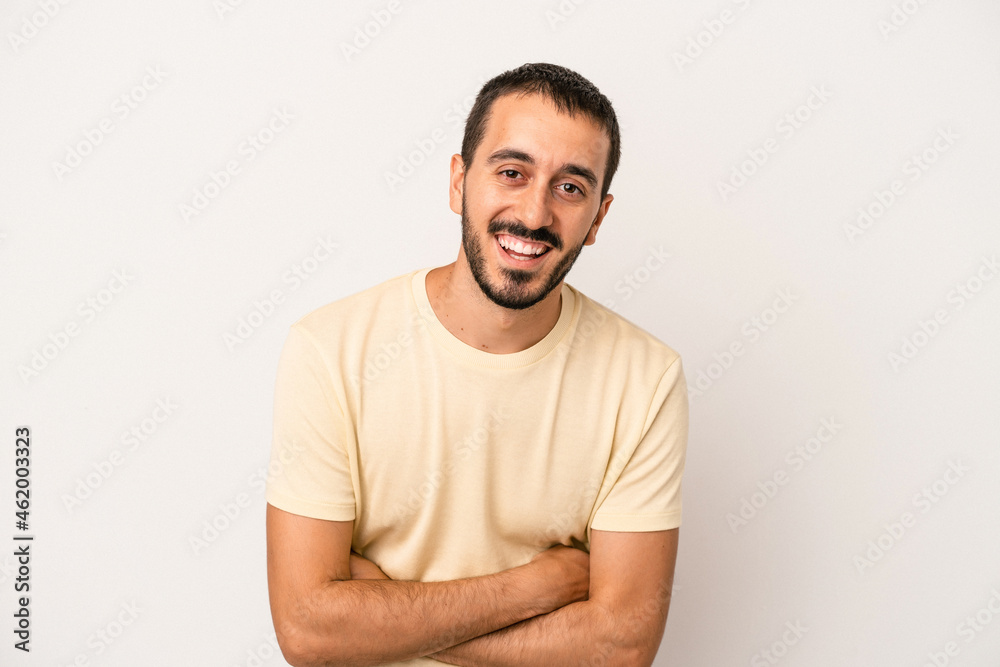 Young caucasian man isolated on white background laughing and having fun. Young caucasian man isolated on white background laughing and having fun.