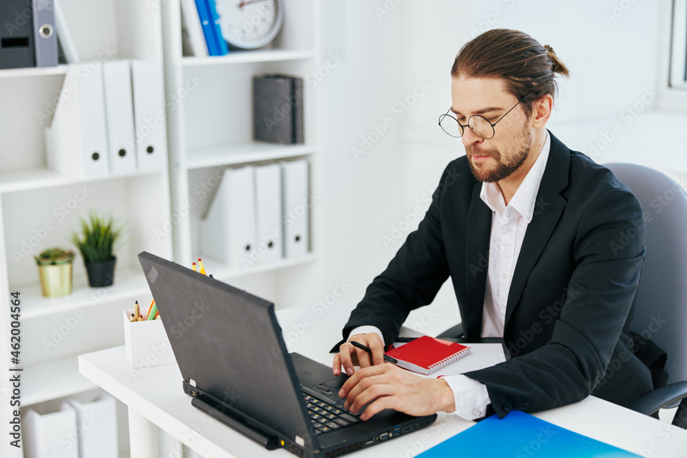 businessman work in the office in front of a laptop lifestyle businessman work in the office in front of a laptop lifestyle