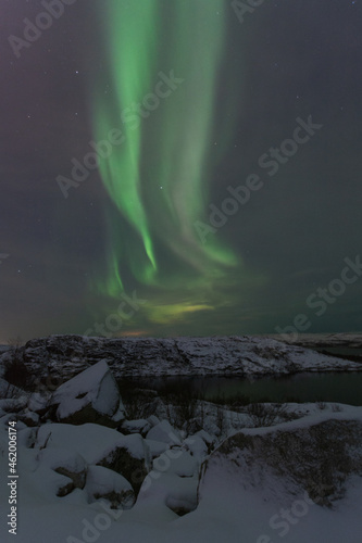 At night in winter, the tundra and the aurora borealis. © Moroshka