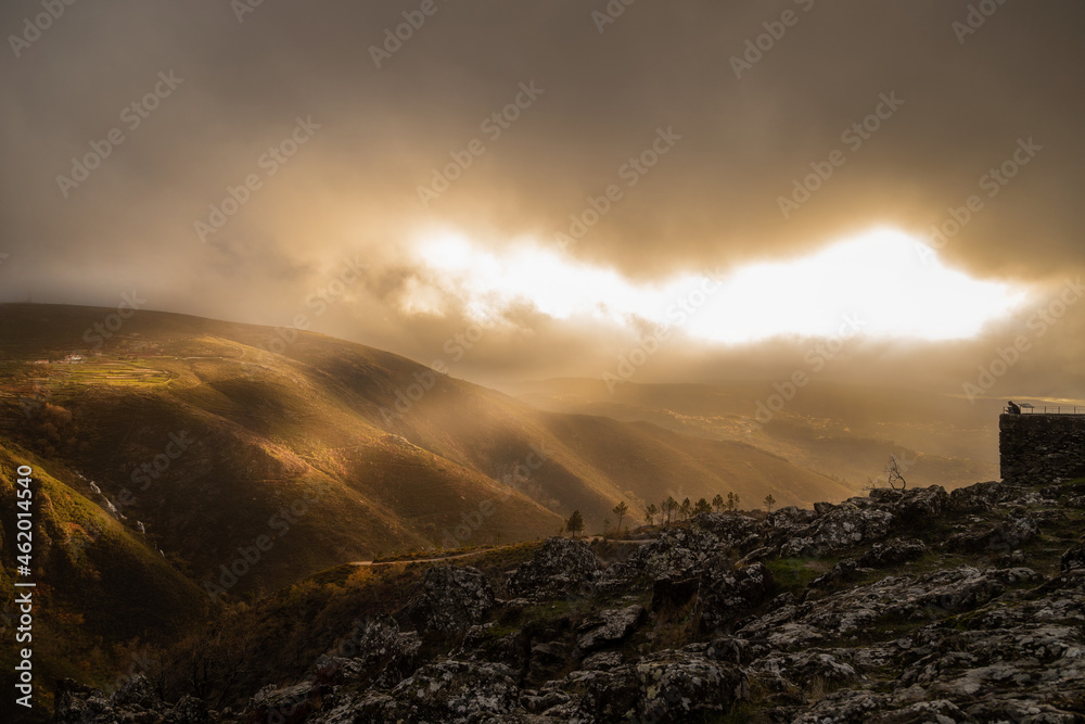 Scenic sunlight between the clouds in Serra da Freita mountains