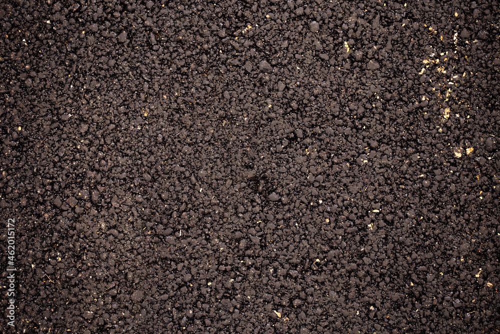 black asphalt background, asphalt texture with stones