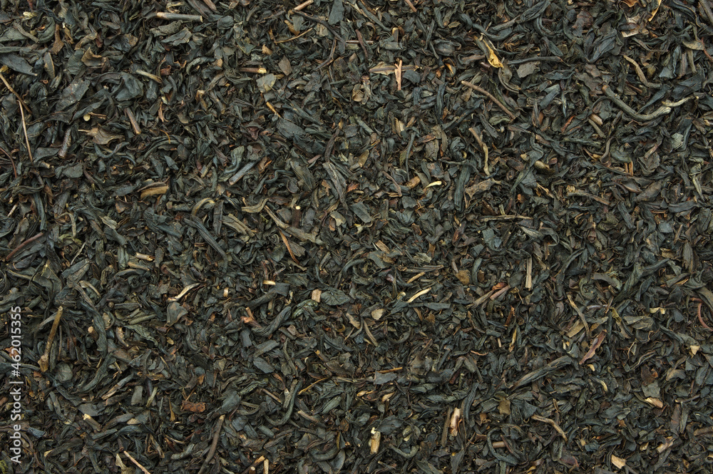 Black tea leaves top view backdrop. close-up detail background Black tea leaves top view backdrop. close-up detail background