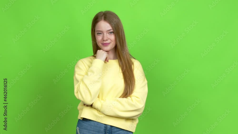Teenager girl standing and thinking an idea pointing the finger up over isolated background. Green screen chroma key Teenager girl standing and thinking an idea pointing the finger up over isolated background. Green screen chroma key