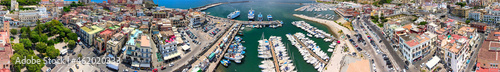 Aerial view of Pozzuoli port from a drone in summer season, Italy