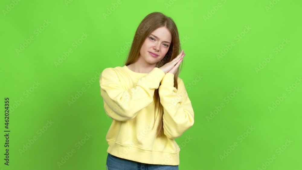 Teenager girl making sleep gesture. Adorable and sweet expression over isolated background. Green screen chroma key Teenager girl making sleep gesture. Adorable and sweet expression over isolated background. Green screen chroma key