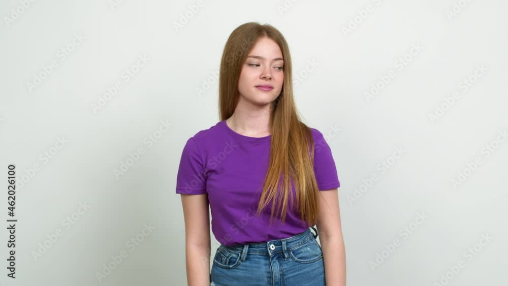 Teenager girl looking side over isolated background Teenager girl looking side over isolated background