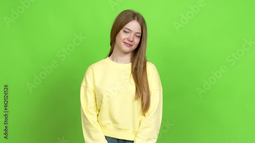 Teenager girl with happy face over isolated background. Green screen chroma key
