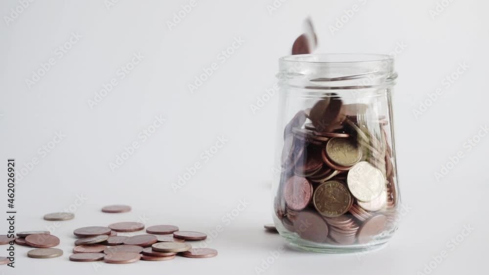 FHD formate. Save money and account banking for finance concept, Coin falling in bottle, Slow motion FHD formate. Save money and account banking for finance concept, Coin falling in bottle, Slow motion