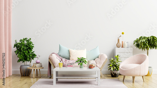 Empty light white wall background, there is a living room with sofa and armchair.