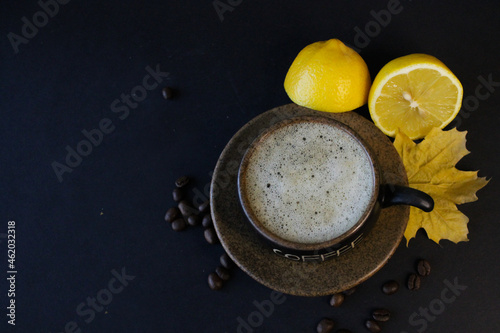 cup of coffee with lemon