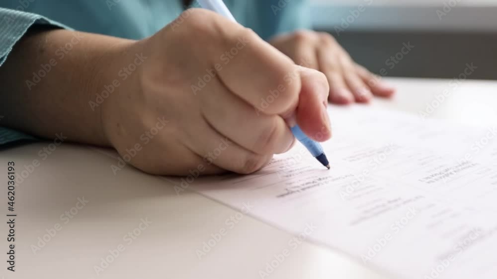 Voting in the Duma elections, president, laws. A human holds a pen for signing documents Voting in the Duma elections, president, laws. A human holds a pen for signing documents