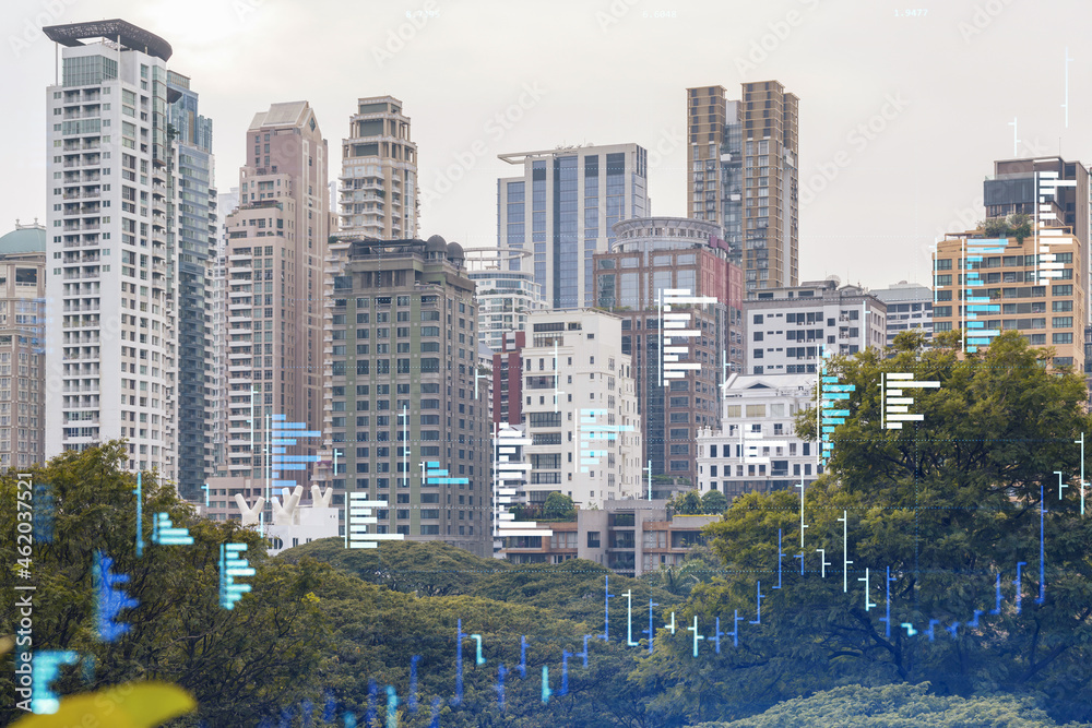 Obraz premium Financial stock chart hologram over panorama city view of Bangkok, business center in Southeast Asia. The concept of international transactions. Double exposure.