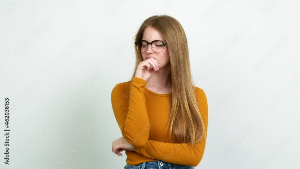 Teenager girl with glasses and thinking Teenager girl with glasses and thinking