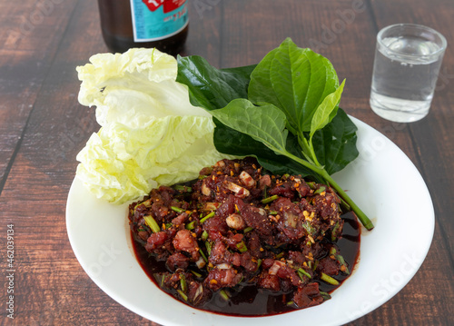 Konstfotografi Northeastern Thai raw beef and blood called Larb Nya