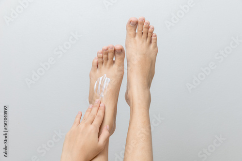 asian women Applying foot cream