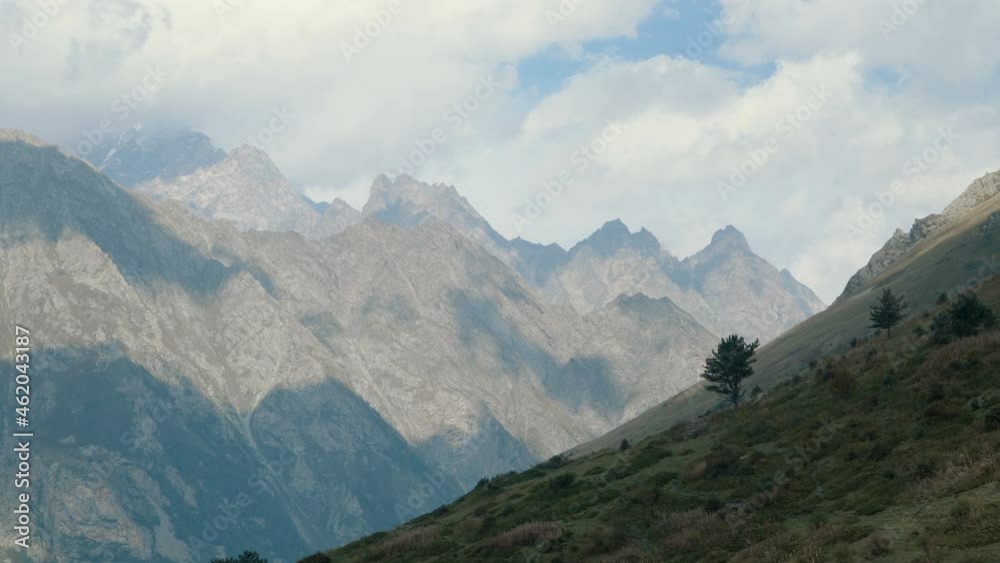 Beautiful Caucasus mountain landscape timelapse. Clouds moving over the mountains. The weather in the mountains changes very quickly. Beautiful Caucasus mountain landscape timelapse. Clouds moving over the mountains. The weather in the mountains changes very quickly.