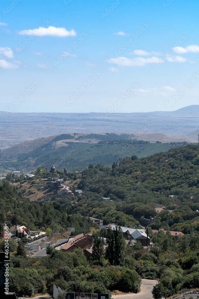 Armenia, Tsaghkadzor, September 2021. Vertical view of the village among the mountains.
