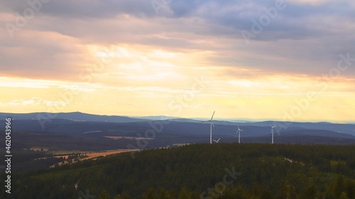 A view to the wind turbines during sunset at Ore mountains  Czech republic