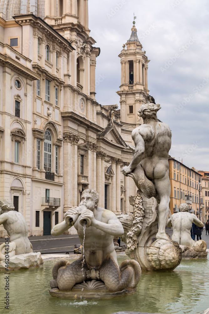  Fontana del Moro (Moor Fountain) with Sant'Agnese in Agone church in background, in the Piazza Navona, Rome, Italy 