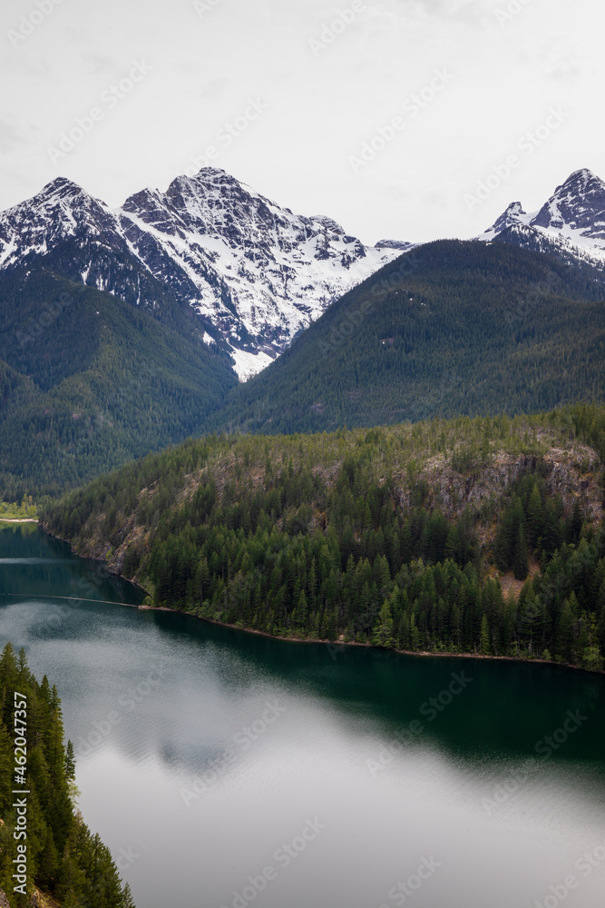 Diablo Lake and mountains at North Cascades National Park in Washington State during spring. Diablo Lake and mountains at North Cascades National Park in Washington State during spring.
