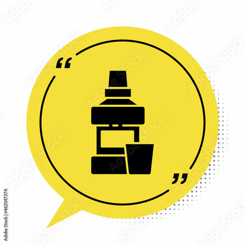 Black Mouthwash plastic bottle and glass icon isolated on white background. Liquid for rinsing mouth. Oralcare equipment. Yellow speech bubble symbol. Vector