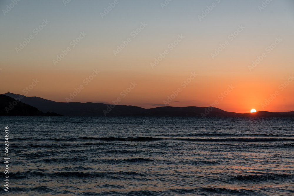 Sunset at Agios Georgios beach in Chora of Naxos island, Cyclades, Greece