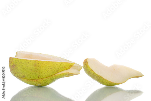 Several sweet pear slices, close-up, isolated on white. photo