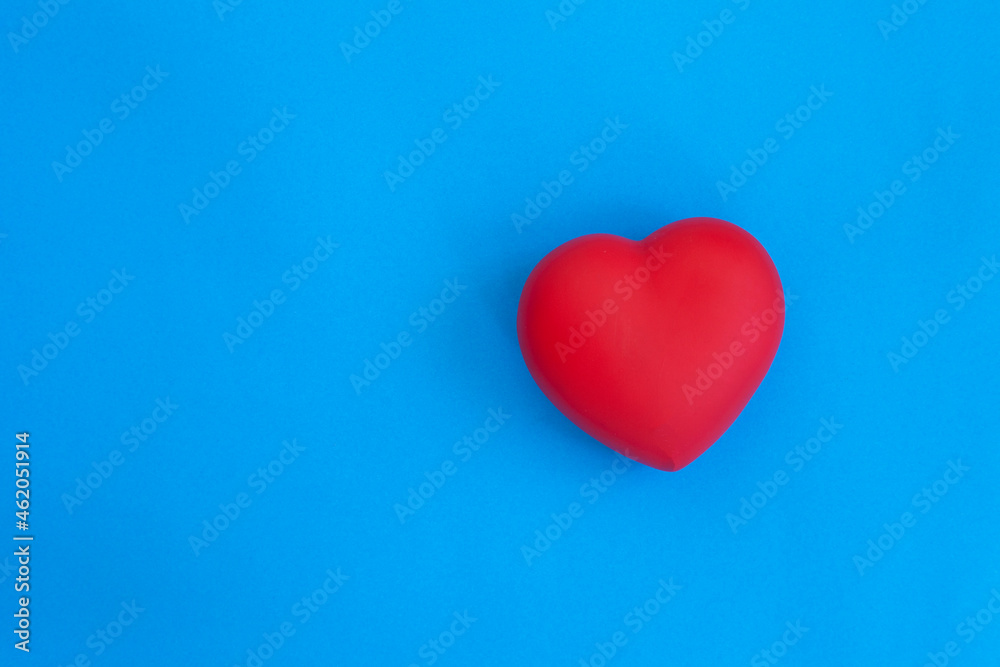 red heart on blue background