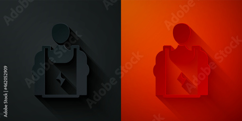 Paper cut Bodybuilder showing his muscles icon isolated on black and red background. Fit fitness strength health hobby concept. Paper art style. Vector