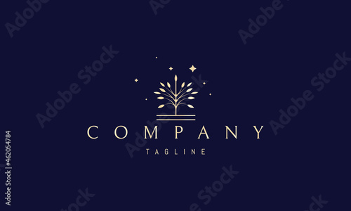 Vector golden logo on which an abstract image of the tree of well being.