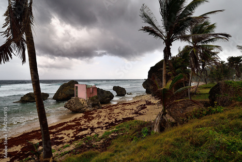 Stormy weather above famous rocks formation on the beach of Bathsheba, East coast of island Barbados, Caribbean Islands