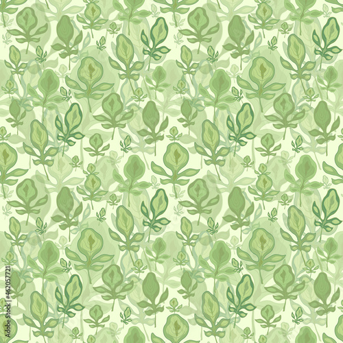 Green leaves of different sizes seamless pattern