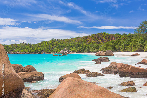 White sand, blue ocean and rocks at the beautiful Anse Lazio Beach on Praslin Island, Seychelles. © Ирина Васильева