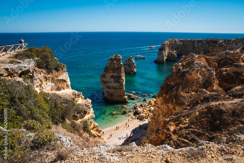 beach with blue sea on the slope