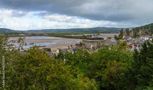 view to the well preserved and imposing fortress of the 13th century medieval Conwy castle and estuary, seen from the Western town wall © Martin