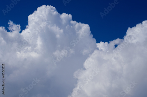 white fluffy clouds in the blue sky © Lana-Fotini