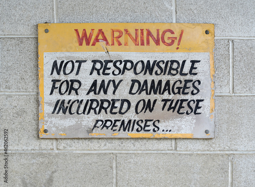 Warning sign found at an abandoned car wash