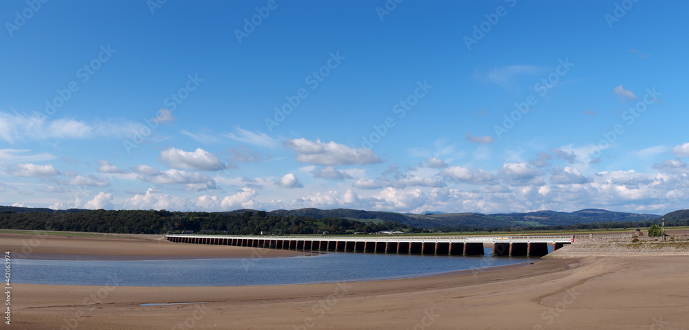 panoramic view of the beach at arnside with the leven railway viaduct and river in the south lakes area of cumbria panoramic view of the beach at arnside with the leven railway viaduct and river in the south lakes area of cumbria