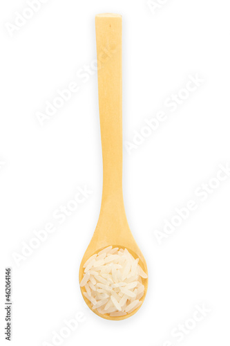 Top view of uncooked dry rice in wooden spoon isolated on white.	