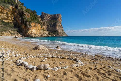 Mediterranean dream beach clear blue water cliffs and fine sand travel Spain Cumbre del Sol Cala Moraig