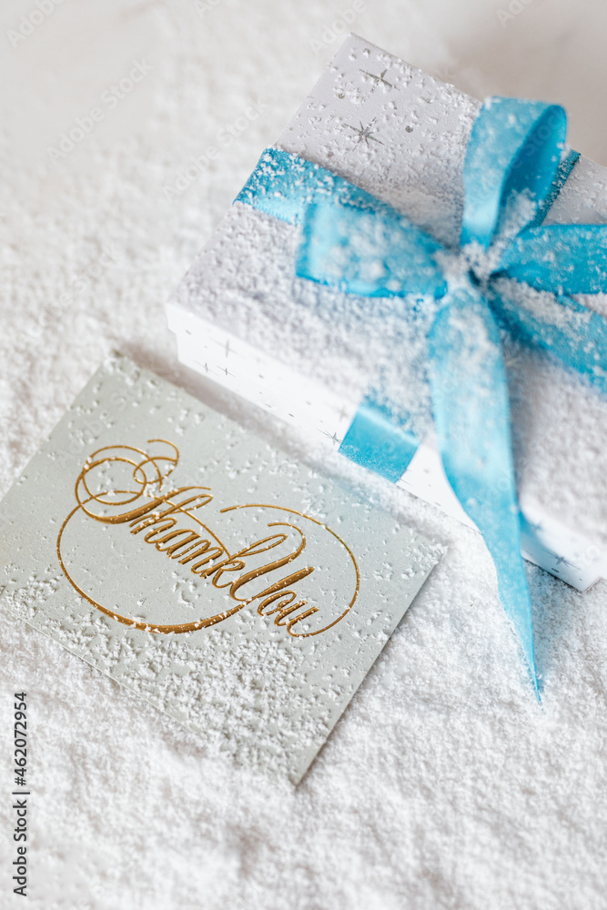 christmas decoration with gift box and blue bows