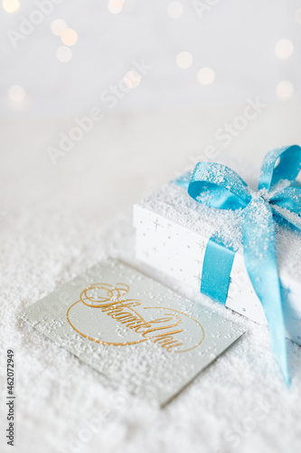 christmas decoration with gift box and blue bows