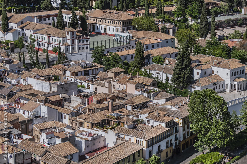 Obraz premium Beautiful aerial view city of Granada in a daytime. Granada - capital city of province of Granada, located at foot of Sierra Nevada Mountains. Granada, Andalusia, Spain.
