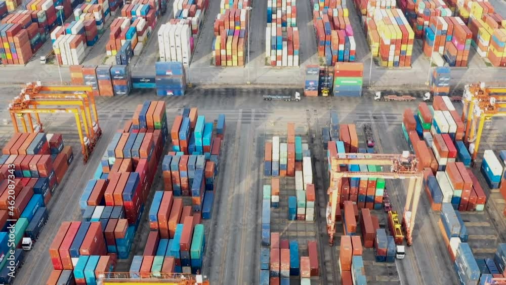 Time lapse,Aerial view At  container ship terminal,Industrial business import and export Logistics and Supply Chain