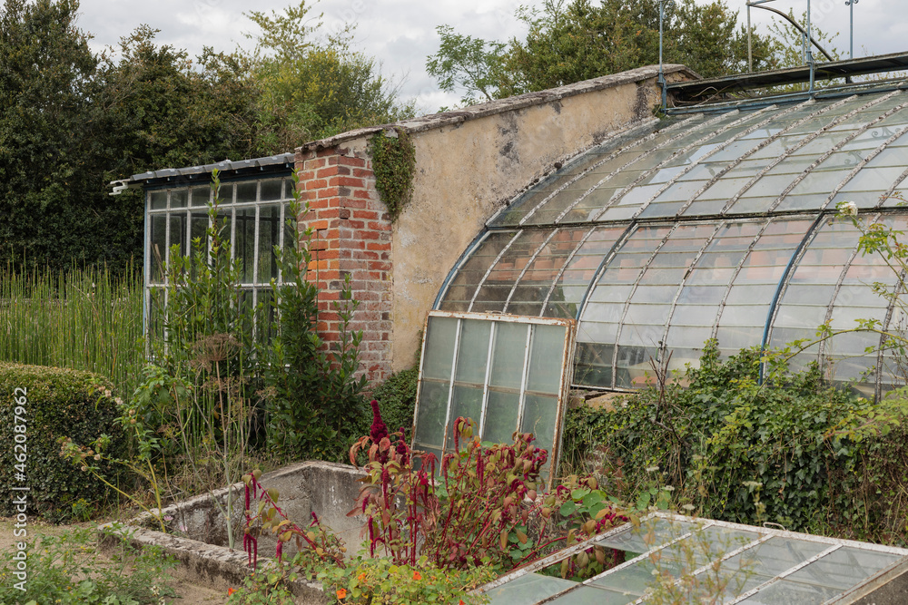 Old green house and cold frames in an allotment Old green house and cold frames in an allotment
