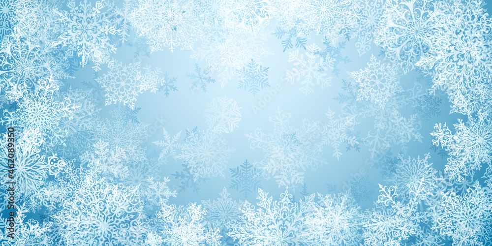 Christmas background of big complex snowflakes in light blue colors