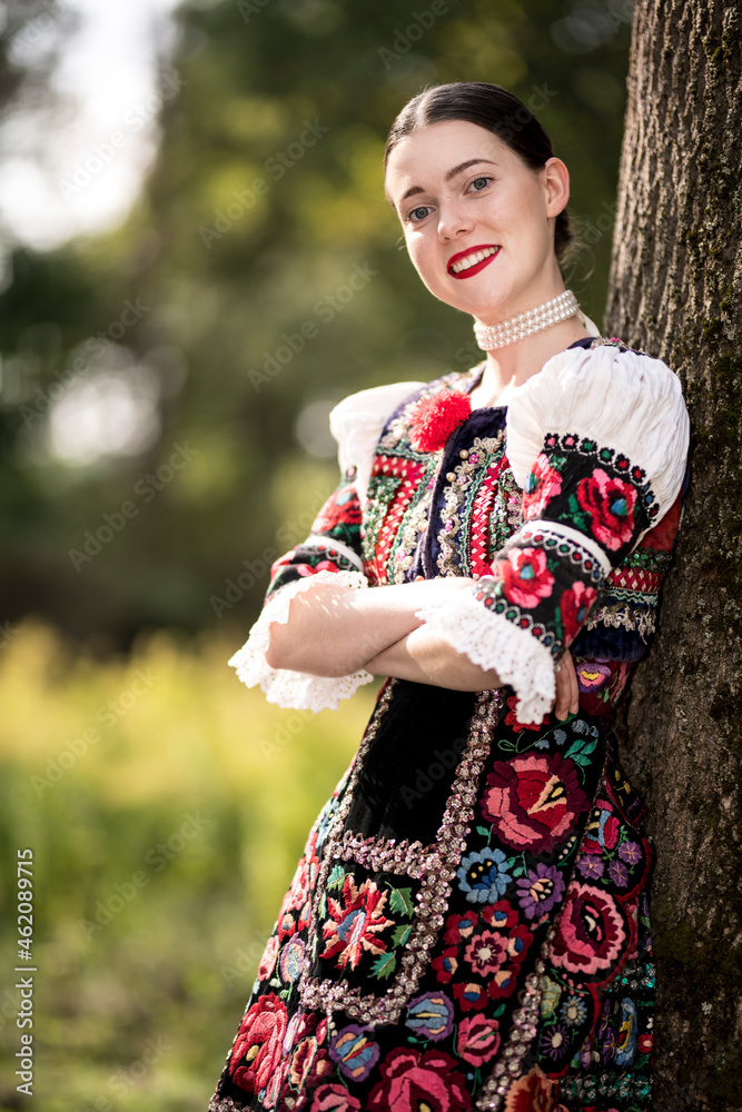 Young beautiful slovak woman in traditional dress. Slovak folklore Young beautiful slovak woman in traditional dress. Slovak folklore