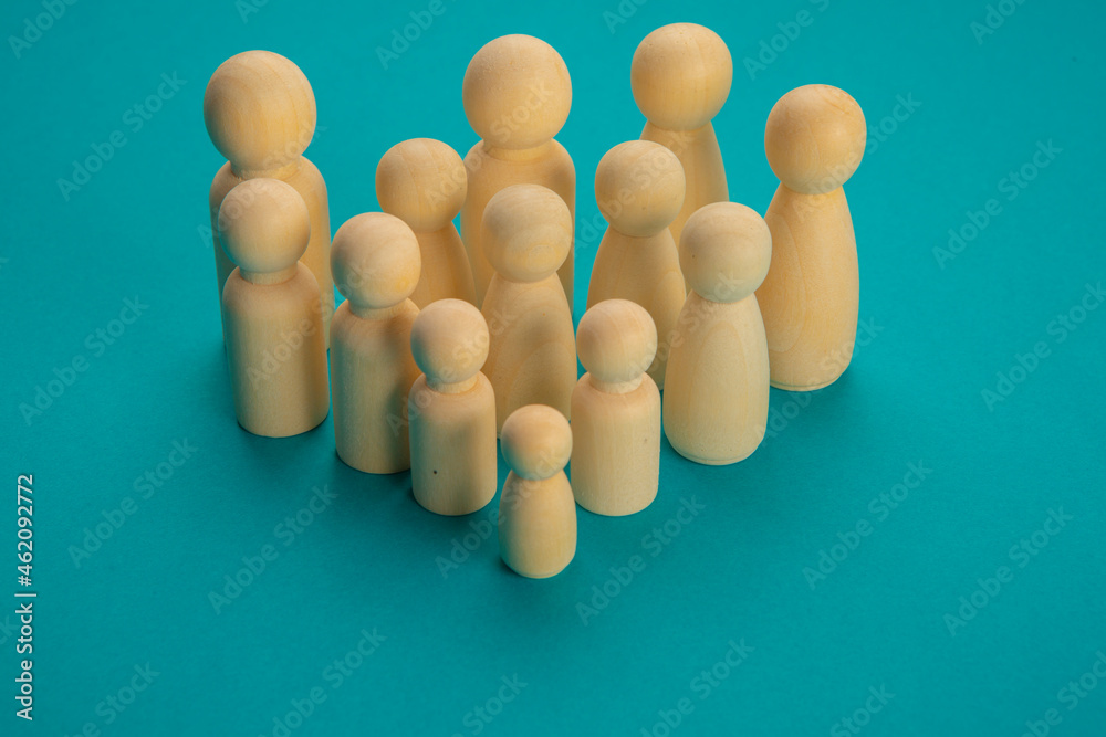 Grouping of wooden chips in the shape of people of different heights as a demonstration or meeting
Grouping of wooden chips in the shape of people of different heights as a demonstration or meeting