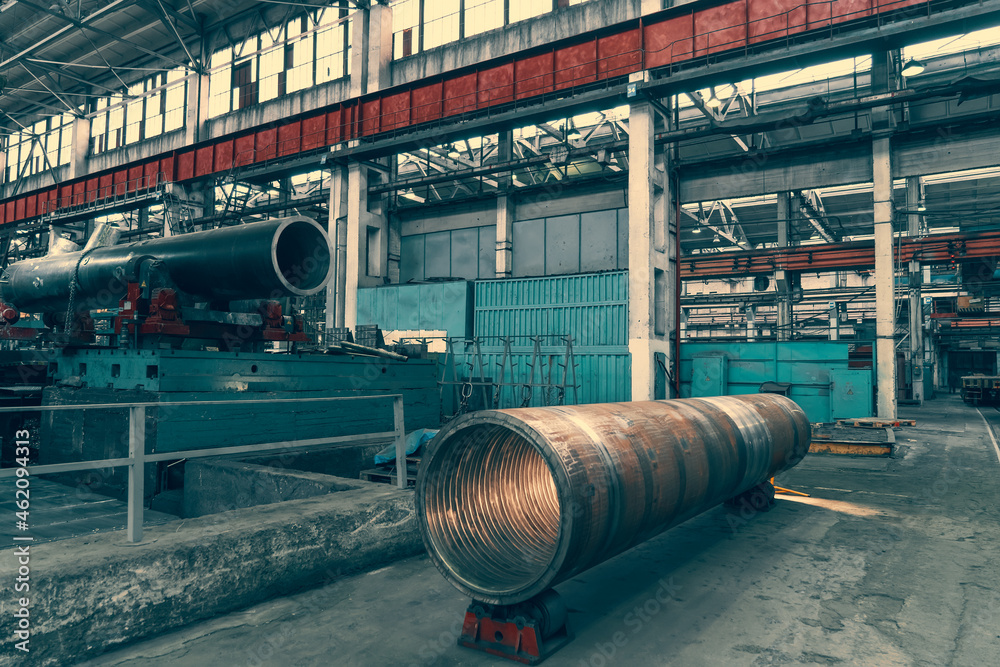 Steel pipes for processing in metal production workshop, metallurgical plant, heavy industry metalwork.